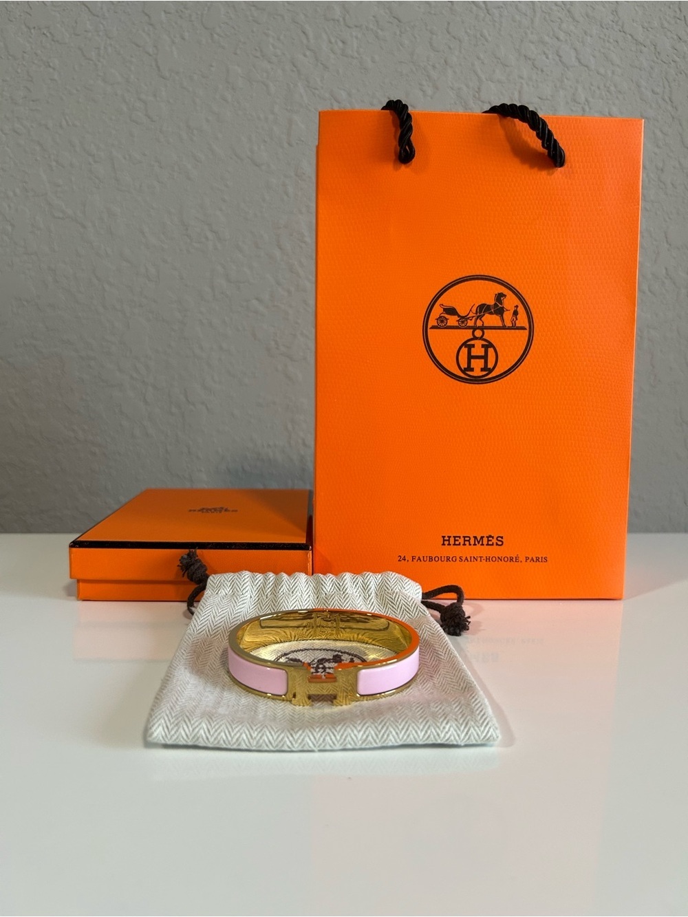 Hermes Pink And Gold Clic
H Bracelet